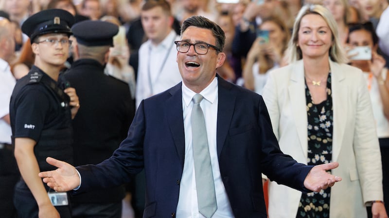 Andy Burnham celebrates after his swearing-in as MP at the Houses of Parliament in June 2026. All photos: Getty Images
