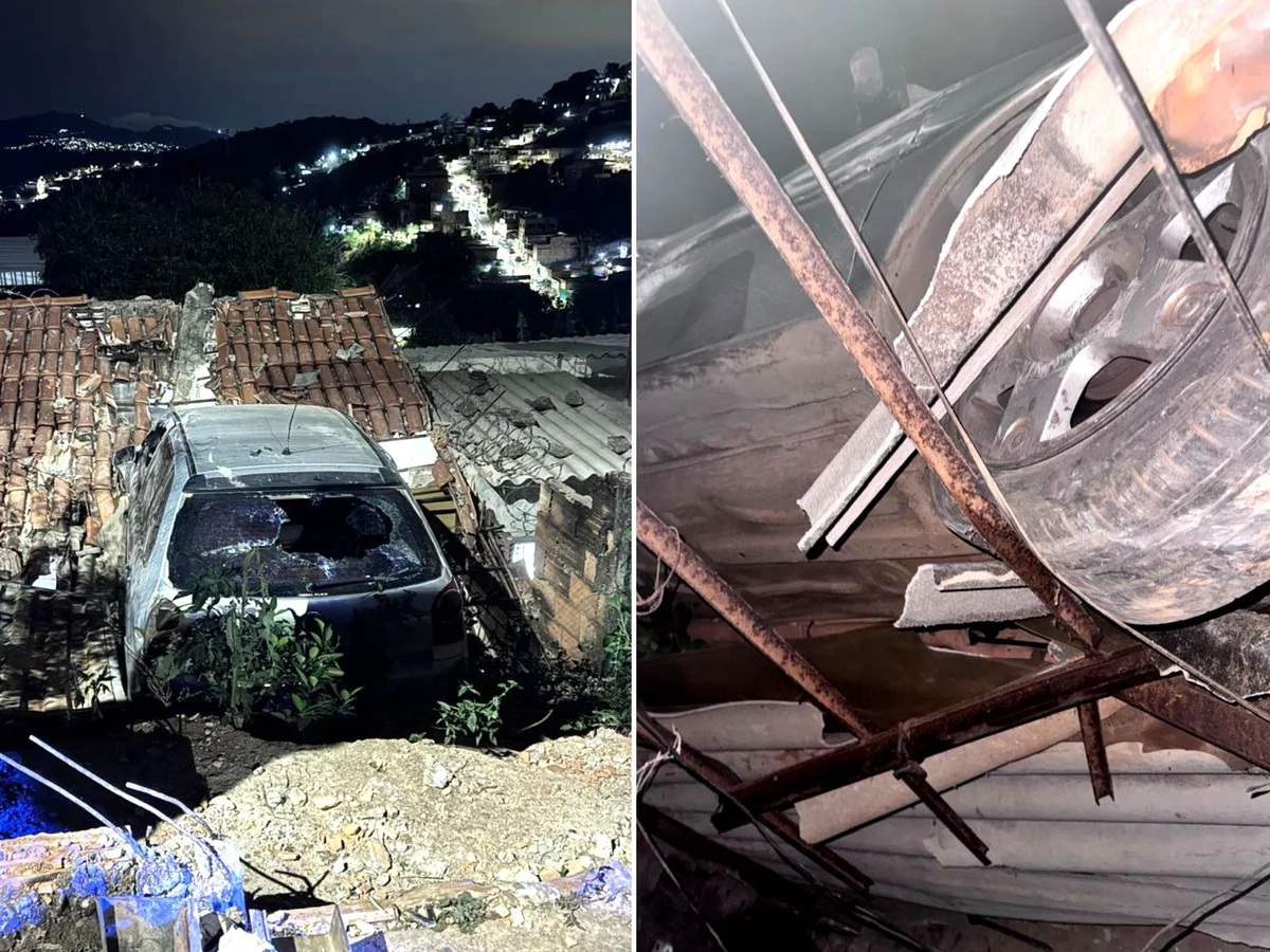 Carro bate em muro e fica "pendurado" sobre telhado de casa em BH