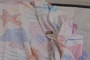 Projétil foi encontrado em cima da cama do casal.