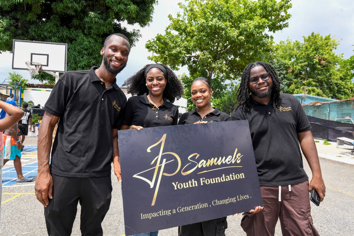 Alex Ward (left), founder of the JP Samuels Foundation, shares a moment with the executive members of the team (from left) Nashae Brown, Tyshaun Johnson and Jonathan Lathan.