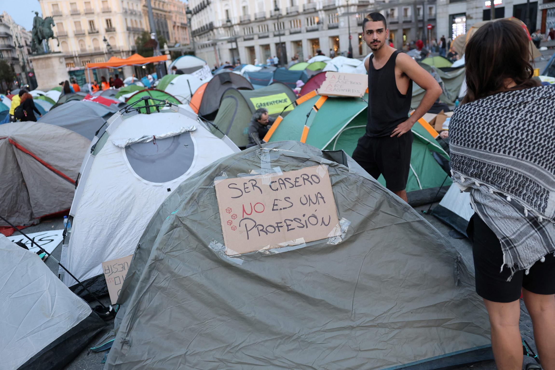 Demonstrators wake up in their camp with tents one day after a protest against evictions and the housing crisis in front of the Presidency of the Community of Madrid in Puerta del Sol plaza in Madrid on September 27, 2026.