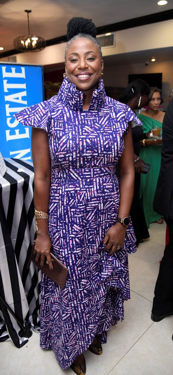 Danielle Cameron Duncan, senior vice-president of payments and enterprise operations at National Commercial Bank, lets the prints by Etal do the talking.