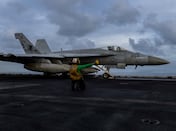 Stocks tumble and oil jumps as US military build-up stokes fear of prolonged war
