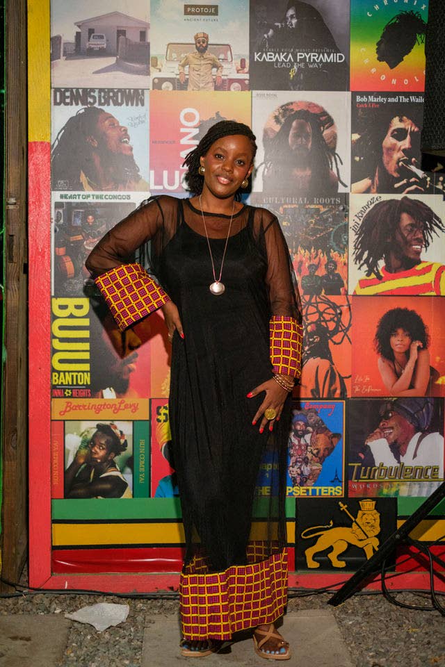 All the way from Kenya, Sheila Thuo joins the AfroSZN crowd in a black dress with patterned details.